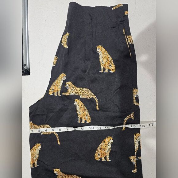 Stylish black wide-leg pants. Features a bold leopard print. - Picture 6 of 15